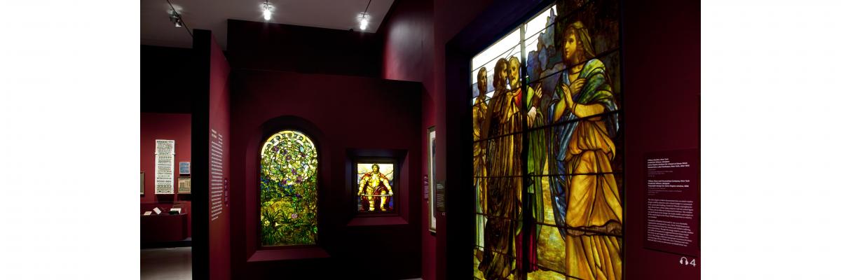 Large Tiffany glass window display at the Neustadt Exhibit for Louis C. Tiffany and the Art of Devotion